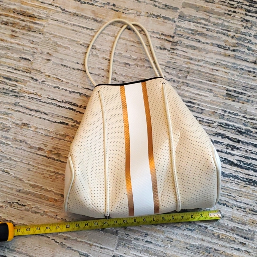 01 cream  shoulder bag from Haute  Shore